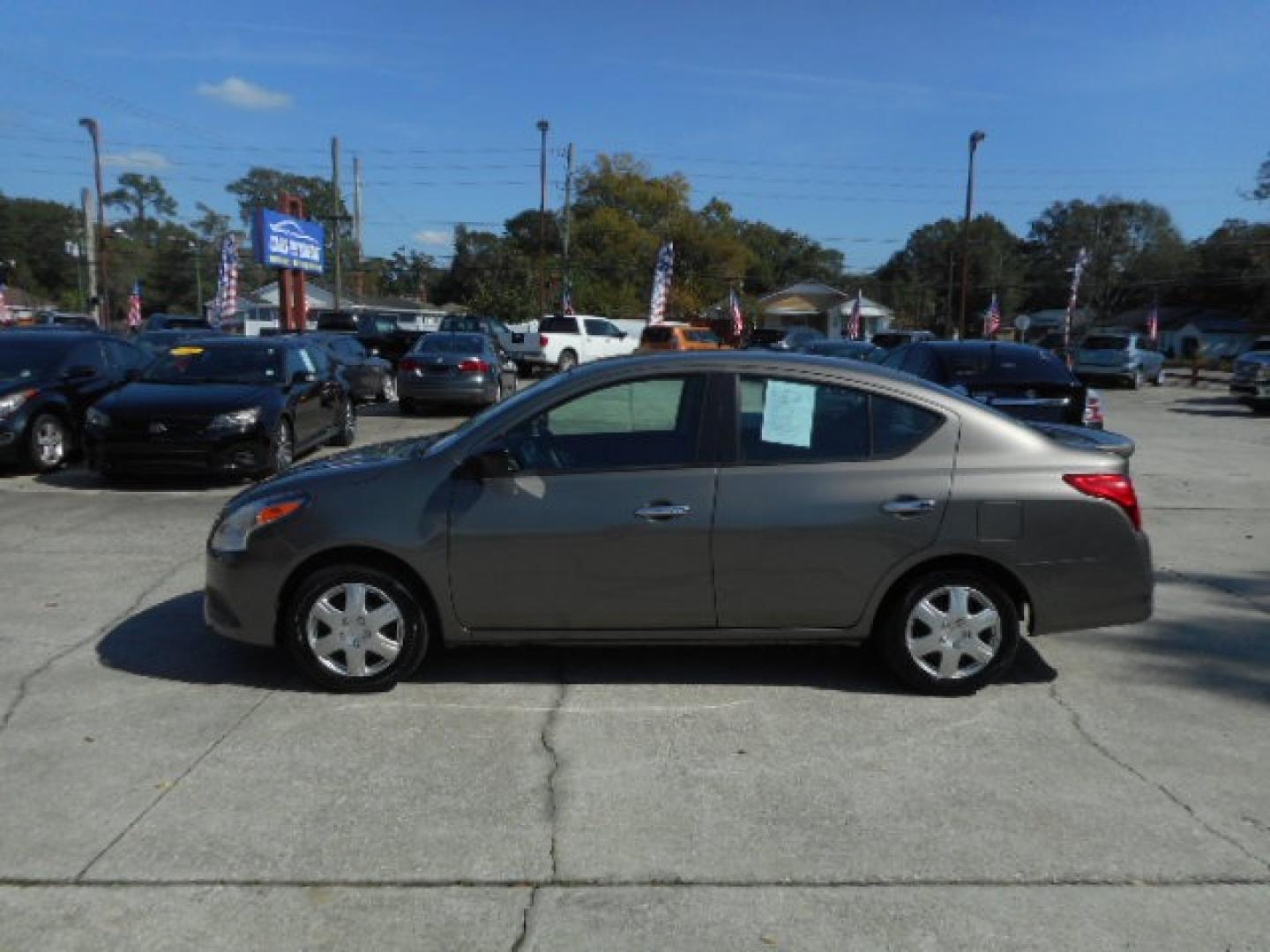 2016 GRY NISSAN VERSA S; SL; SV (3N1CN7AP2GL) , located at 10405 Abercorn Street, Savannah, GA, 31419, (912) 921-8965, 31.988262, -81.131760 - Photo#1