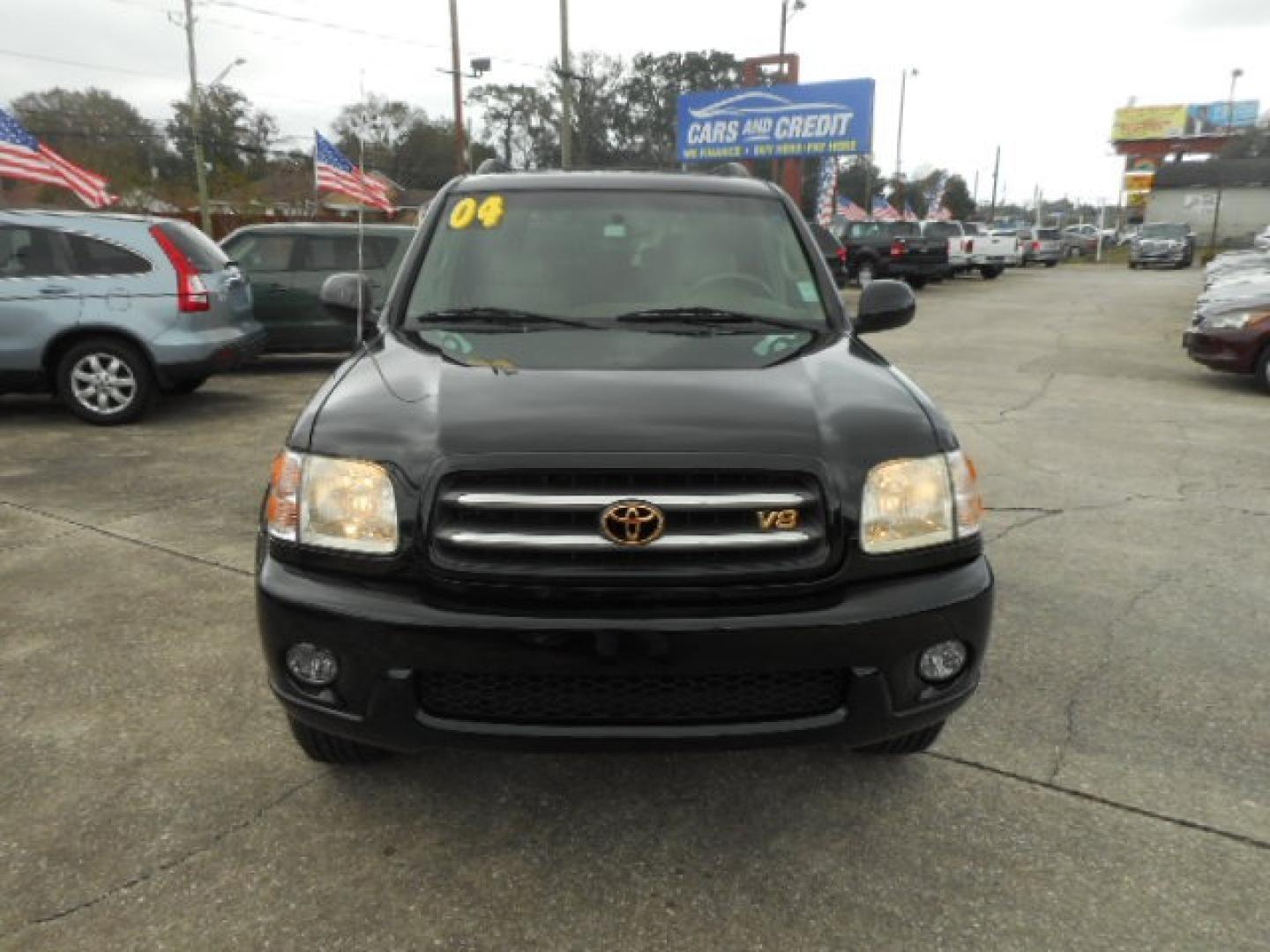 2004 BLACK TOYOTA SEQUOIA LIMITED (5TDZT38A34S) , located at 1200 Cassat Avenue, Jacksonville, FL, 32205, (904) 695-1885, 30.302404, -81.731033 - Photo#0