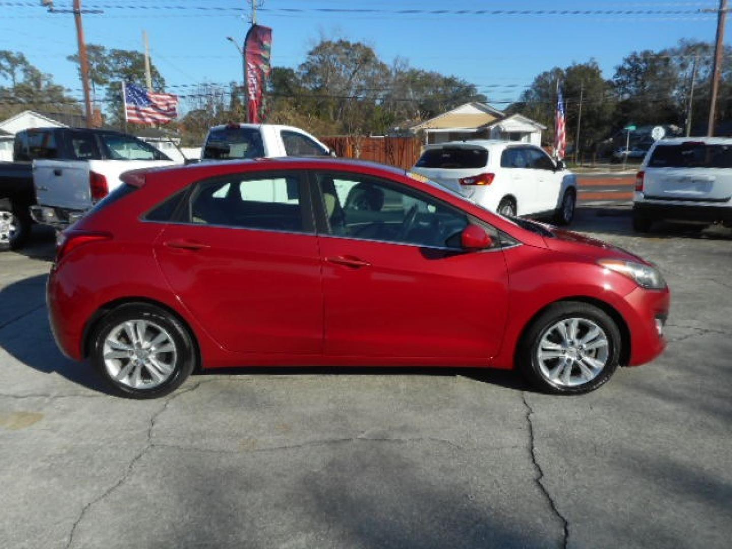 2014 RED HYUNDAI ELANTRA GT BASE (KMHD35LH8EU) , located at 1200 Cassat Avenue, Jacksonville, FL, 32205, (904) 695-1885, 30.302404, -81.731033 - Photo#2