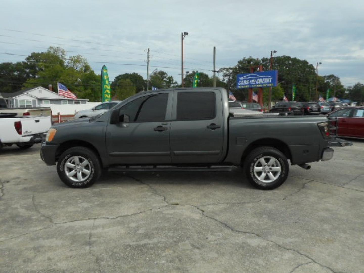 2010 GRAY NISSAN TITAN SE; LE; XE; PR (1N6BA0ECXAN) , located at 390 Hansen Avenue, Orange Park, FL, 32065, (904) 276-7933, 30.130497, -81.787529 - Photo#1