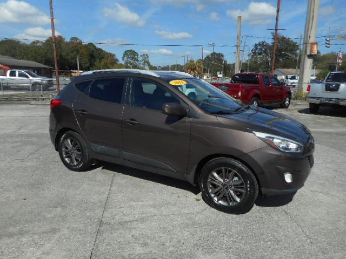 2014 BROWN HYUNDAI TUCSON LIMITED; SE (KM8JU3AG5EU) , located at 1200 Cassat Avenue, Jacksonville, FL, 32205, (904) 695-1885, 30.302404, -81.731033 - Photo#2