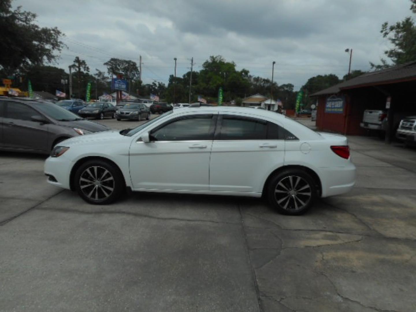 2012 WHITE CHRYSLER 200 (1C3CCBHG1CN) , located at 10405 Abercorn Street, Savannah, GA, 31419, (912) 921-8965, 31.988262, -81.131760 - Photo#1