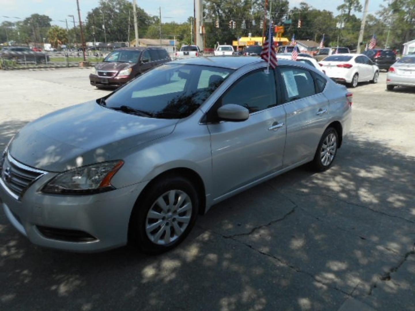 2014 SILVER NISSAN SENTRA (3N1AB7AP3EY) , located at 10405 Abercorn Street, Savannah, GA, 31419, (912) 921-8965, 31.988262, -81.131760 - Photo#1