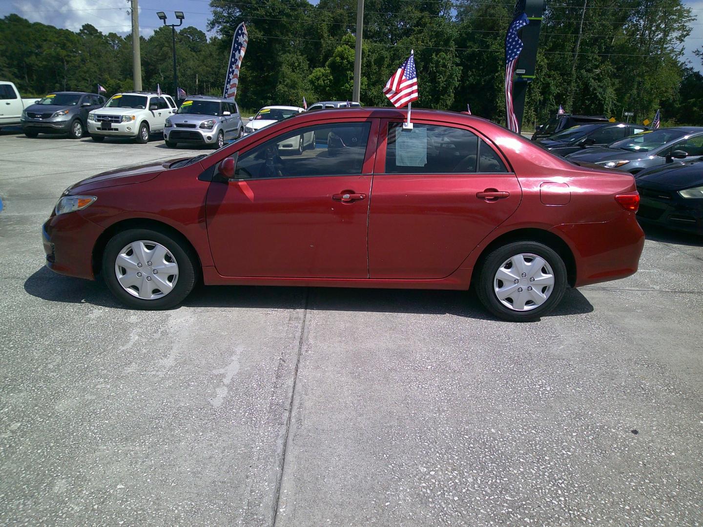 2010 RED TOYOTA COROLLA BASE; S; LE; (1NXBU4EE8AZ) , located at 10405 Abercorn Street, Savannah, GA, 31419, (912) 921-8965, 31.988262, -81.131760 - Photo#4