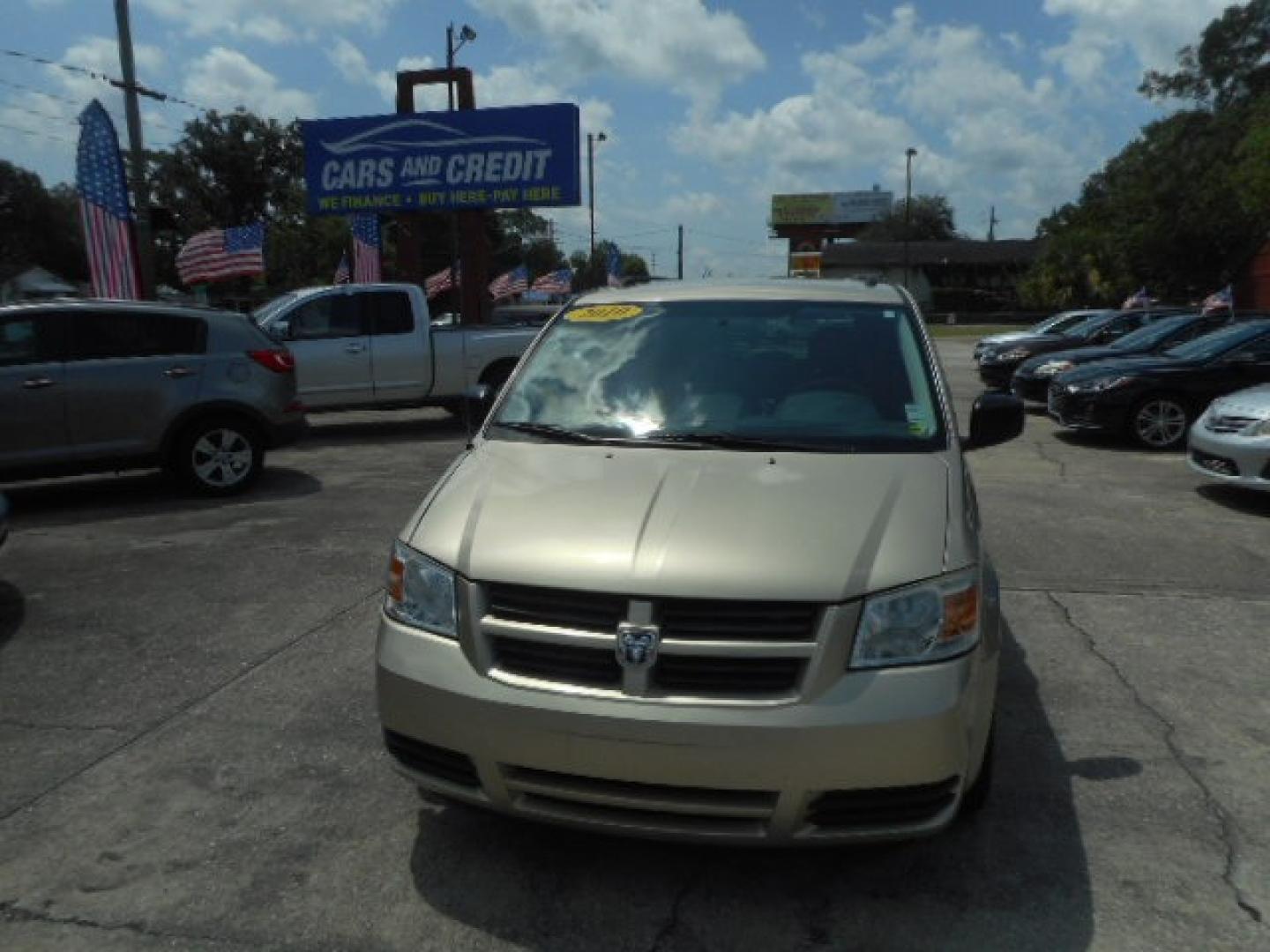 2010 GOLD DODGE GRAND CARAVAN HERO (2D4RN3D13AR) , located at 1200 Cassat Avenue, Jacksonville, FL, 32205, (904) 695-1885, 30.302404, -81.731033 - Photo#0