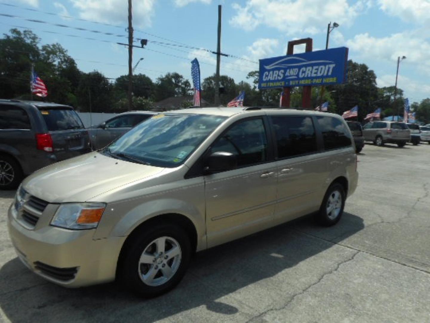 2010 GOLD DODGE GRAND CARAVAN HERO (2D4RN3D13AR) , located at 1200 Cassat Avenue, Jacksonville, FL, 32205, (904) 695-1885, 30.302404, -81.731033 - Photo#1