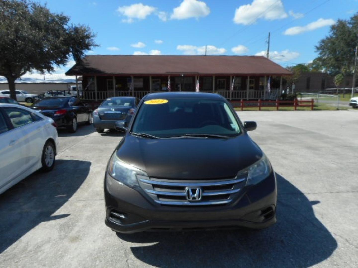 2014 BROWN HONDA CR-V LX (2HKRM3H38EH) , located at 1200 Cassat Avenue, Jacksonville, FL, 32205, (904) 695-1885, 30.302404, -81.731033 - Photo#0