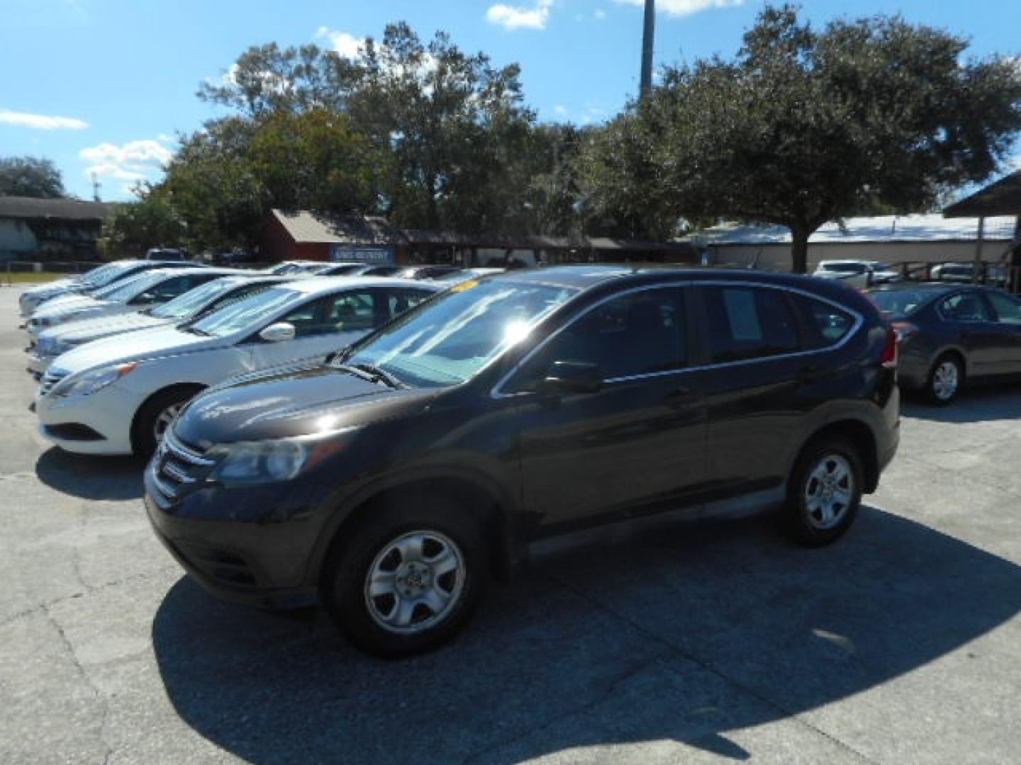 2014 BROWN HONDA CR-V LX (2HKRM3H38EH) , located at 1200 Cassat Avenue, Jacksonville, FL, 32205, (904) 695-1885, 30.302404, -81.731033 - Photo#1