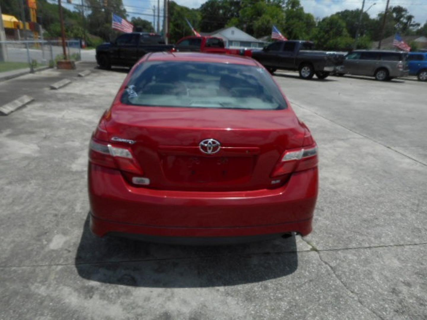 2009 RED TOYOTA CAMRY CE; SE; LE; XL (4T1BE46K99U) , located at 10405 Abercorn Street, Savannah, GA, 31419, (912) 921-8965, 31.988262, -81.131760 - Photo#2