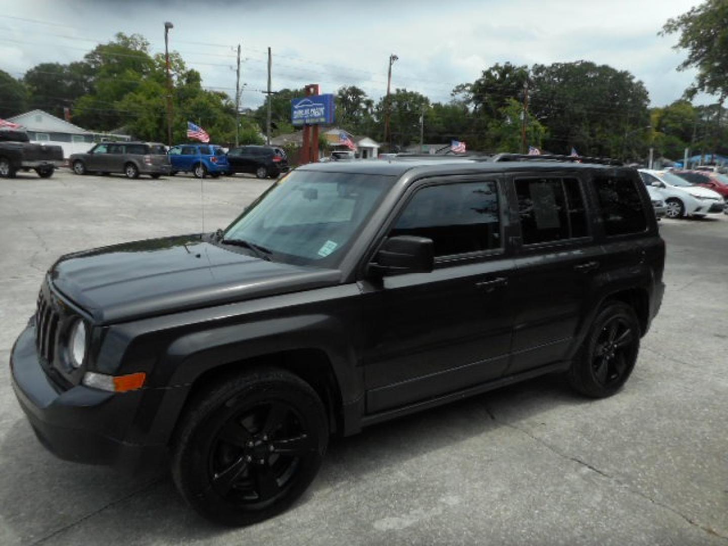 2015 GREEN JEEP PATRIOT SPORT (1C4NJPBA0FD) , located at 1200 Cassat Avenue, Jacksonville, FL, 32205, (904) 695-1885, 30.302404, -81.731033 - Photo#1