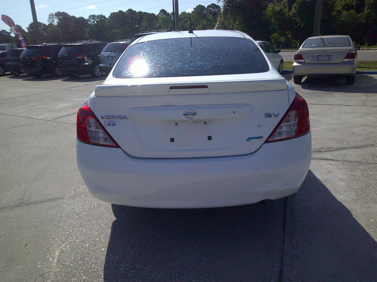 2014 WHITE NISSAN VERSA S; SL; SV (3N1CN7AP4EL) , located at 1200 Cassat Avenue, Jacksonville, FL, 32205, (904) 695-1885, 30.302404, -81.731033 - Photo#3