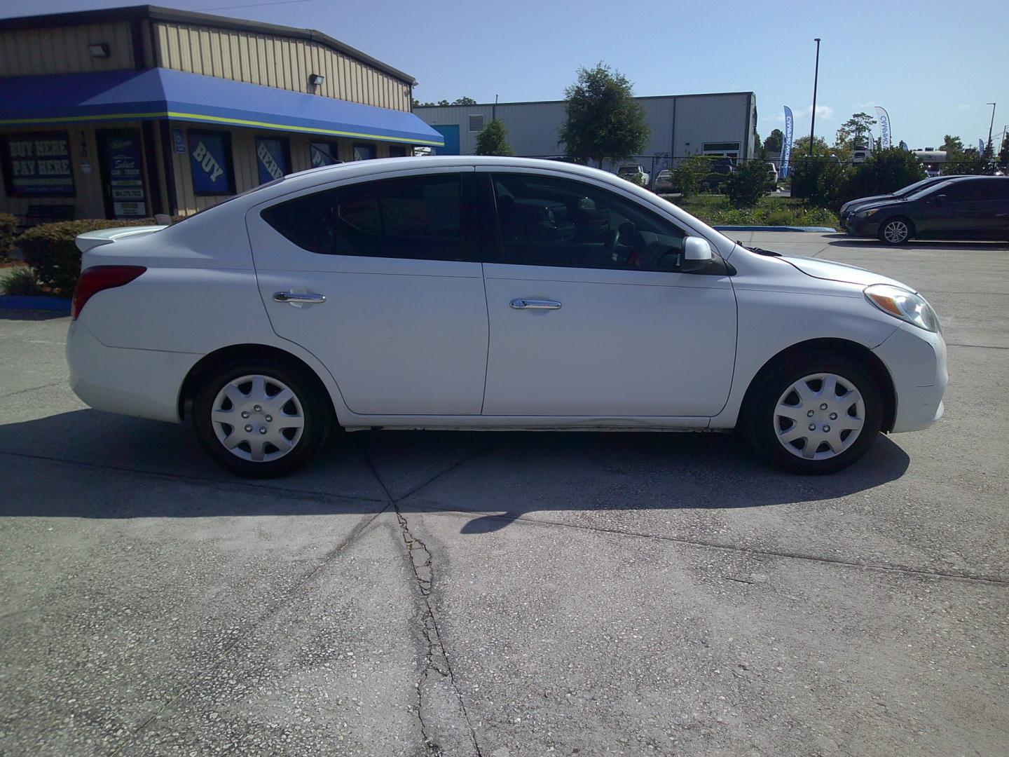 2014 WHITE NISSAN VERSA S; SL; SV (3N1CN7AP4EL) , located at 1200 Cassat Avenue, Jacksonville, FL, 32205, (904) 695-1885, 30.302404, -81.731033 - Photo#2