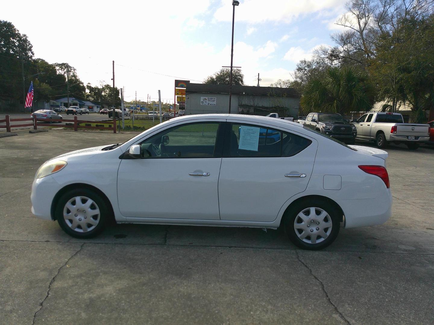 2014 WHITE NISSAN VERSA S; SL; SV (3N1CN7AP4EL) , located at 1200 Cassat Avenue, Jacksonville, FL, 32205, (904) 695-1885, 30.302404, -81.731033 - Photo#0