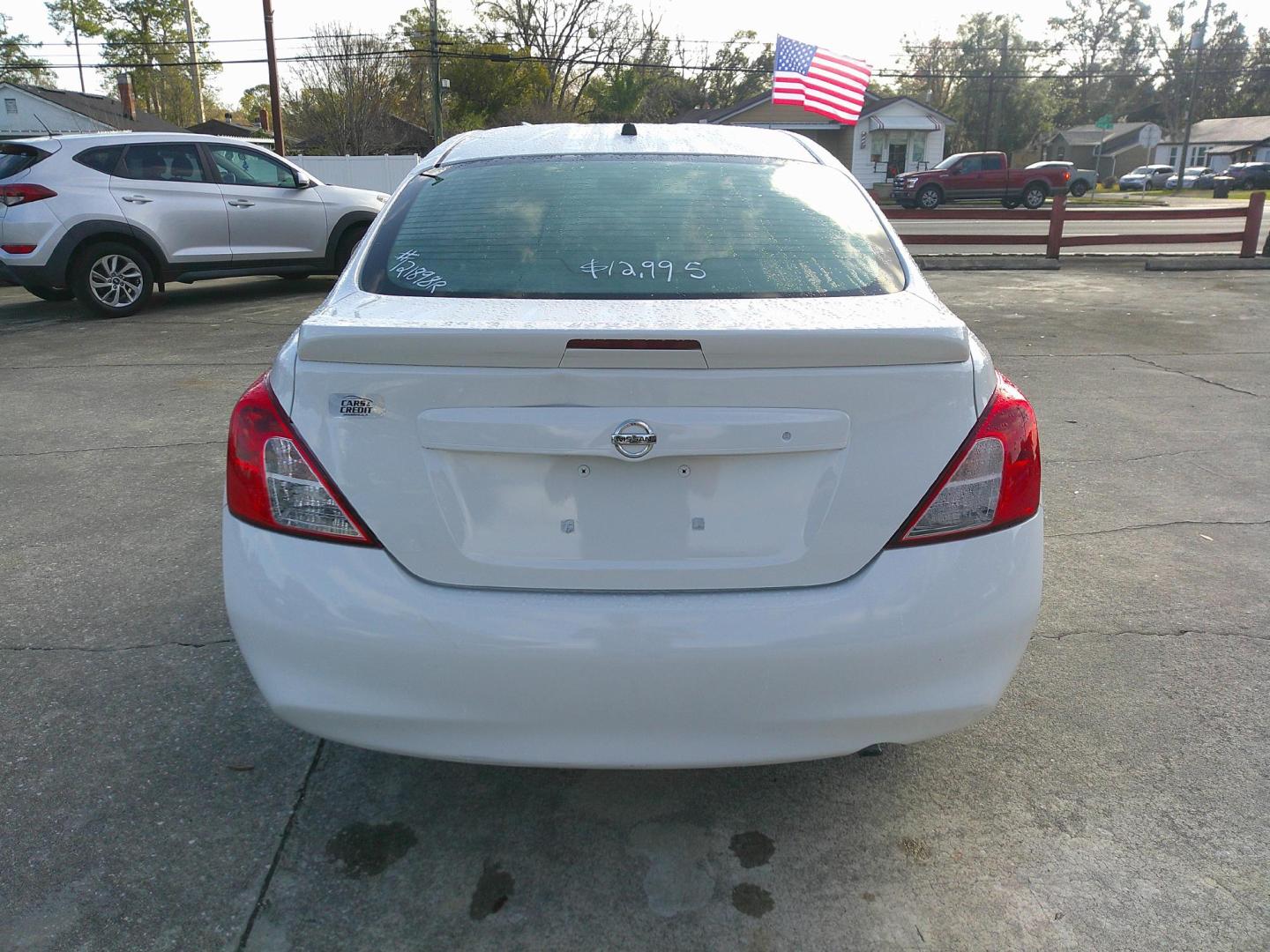 2014 WHITE NISSAN VERSA S; SL; SV (3N1CN7AP4EL) , located at 1200 Cassat Avenue, Jacksonville, FL, 32205, (904) 695-1885, 30.302404, -81.731033 - Photo#3