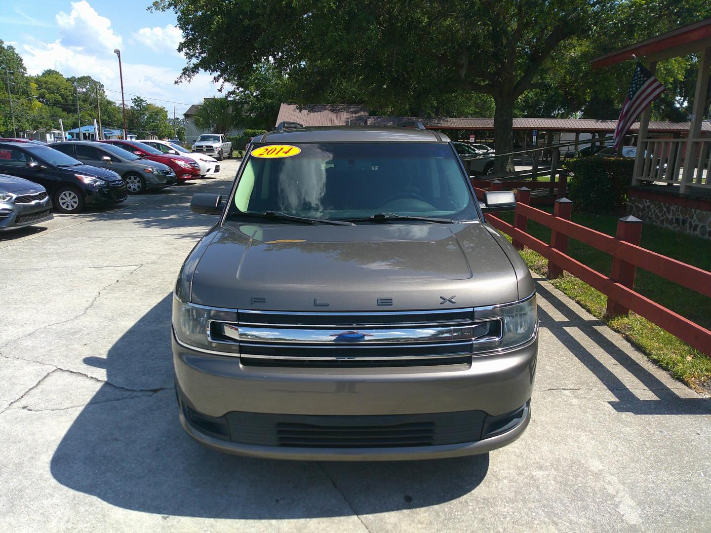 2014 GOLD FORD FLEX SE (2FMGK5B83EB) , located at 10405 Abercorn Street, Savannah, GA, 31419, (912) 921-8965, 31.988262, -81.131760 - Photo#0