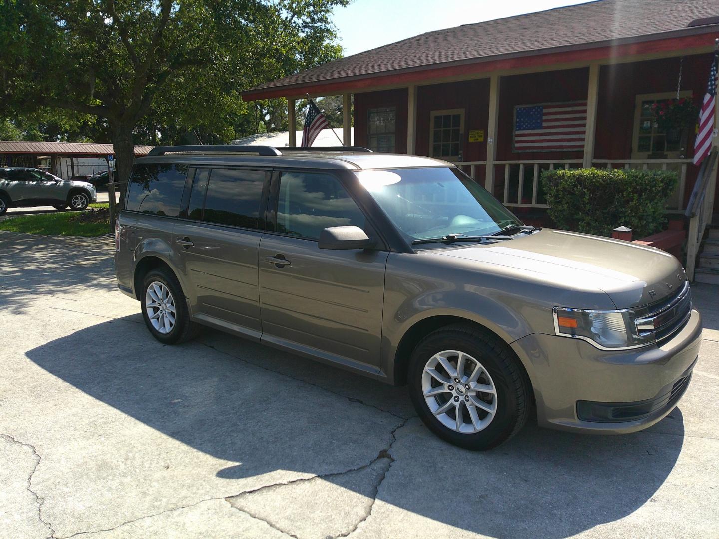 2014 GOLD FORD FLEX SE (2FMGK5B83EB) , located at 10405 Abercorn Street, Savannah, GA, 31419, (912) 921-8965, 31.988262, -81.131760 - Photo#2