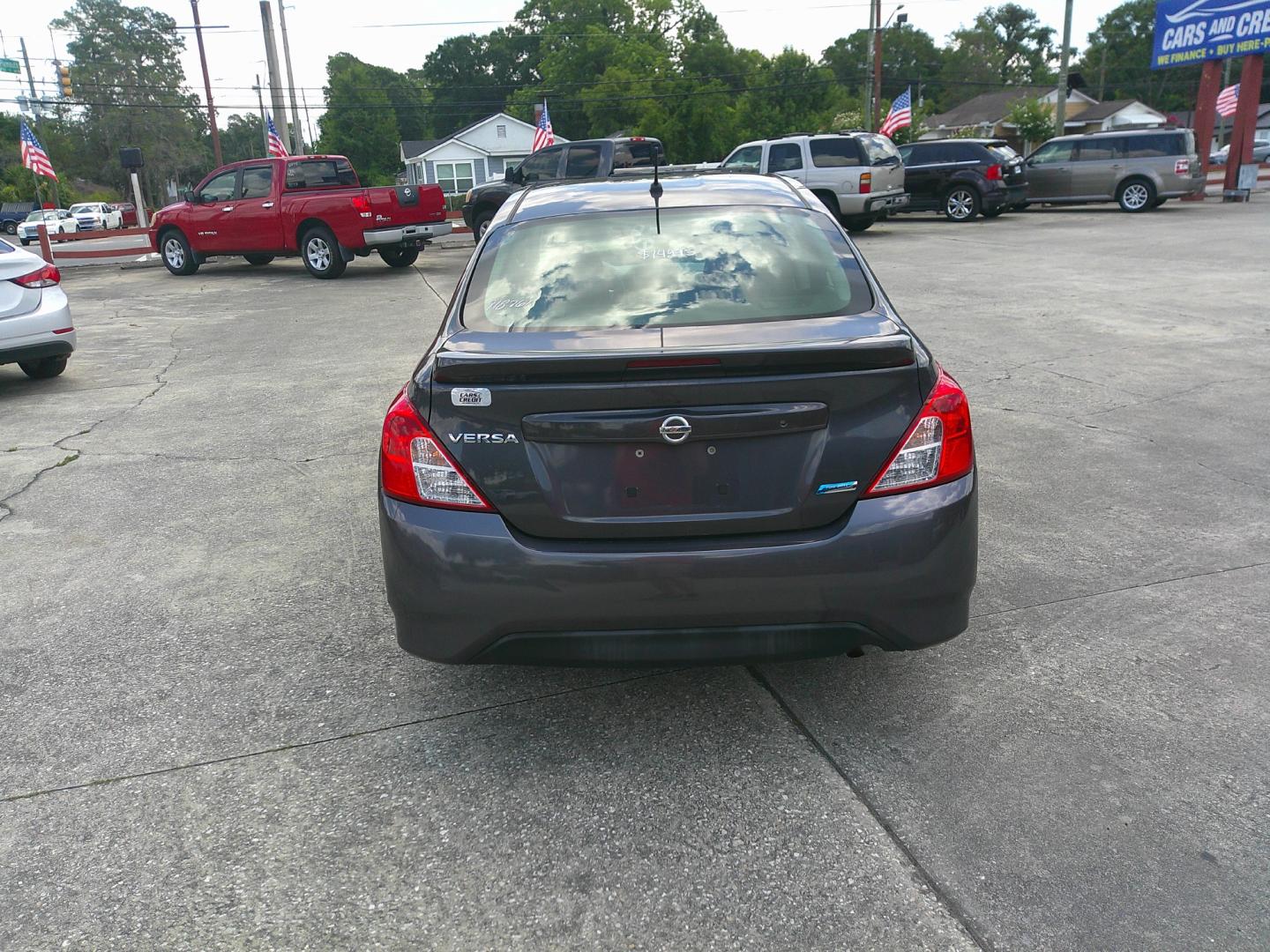 2015 GRAY NISSAN VERSA S; SL; SV (3N1CN7APXFL) , located at 10405 Abercorn Street, Savannah, GA, 31419, (912) 921-8965, 31.988262, -81.131760 - Photo#3