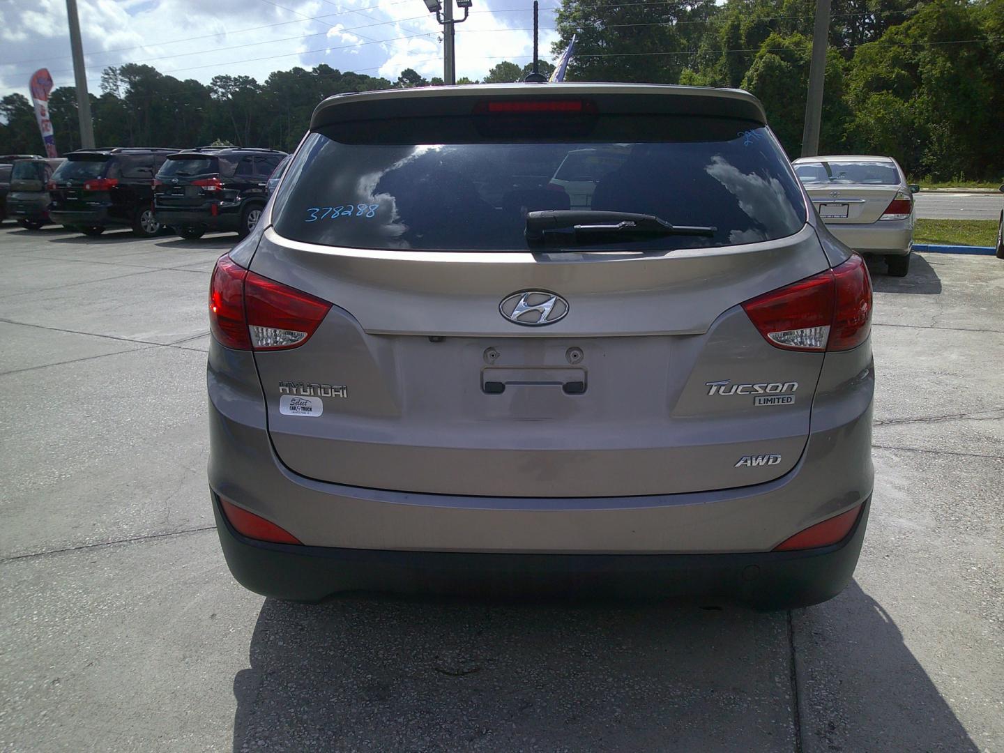 2012 GOLD HYUNDAI TUCSON GLS; LIMITED (KM8JUCAC1CU) , located at 390 Hansen Avenue, Orange Park, FL, 32065, (904) 276-7933, 30.130497, -81.787529 - Photo#3