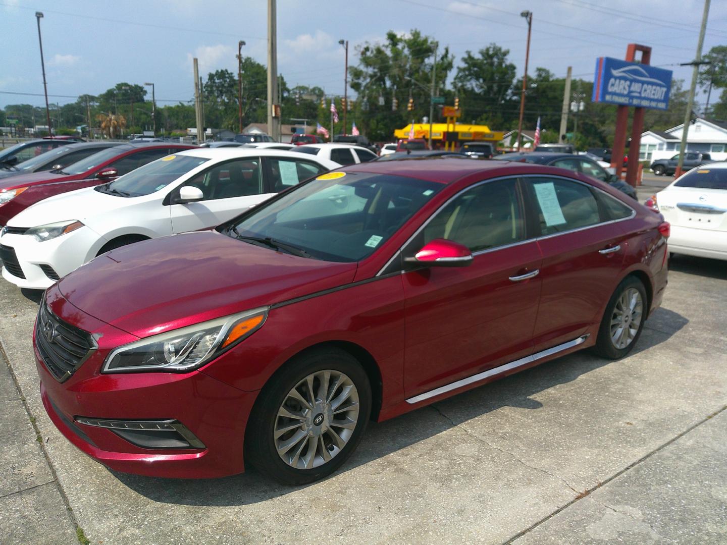 2015 RED HYUNDAI SONATA LIMITED; SPOR (5NPE34AF1FH) , located at 10405 Abercorn Street, Savannah, GA, 31419, (912) 921-8965, 31.988262, -81.131760 - Photo#1