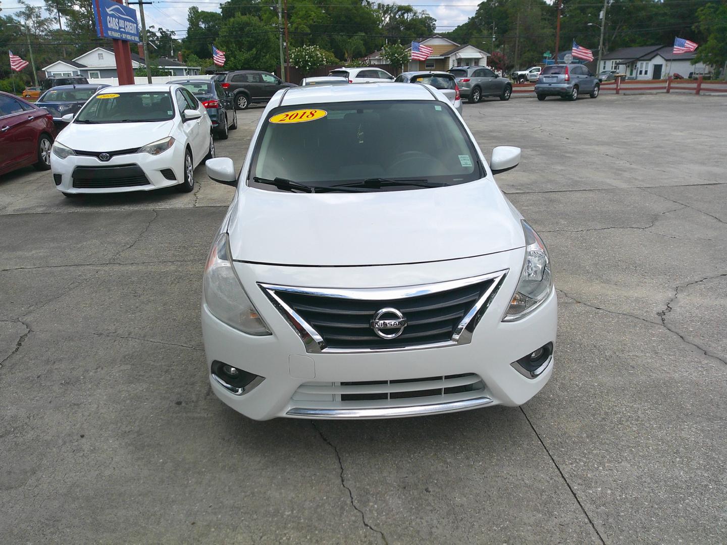 2018 WHITE NISSAN VERSA S; SL; SV (3N1CN7AP8JL) , located at 1200 Cassat Avenue, Jacksonville, FL, 32205, (904) 695-1885, 30.302404, -81.731033 - Photo#0