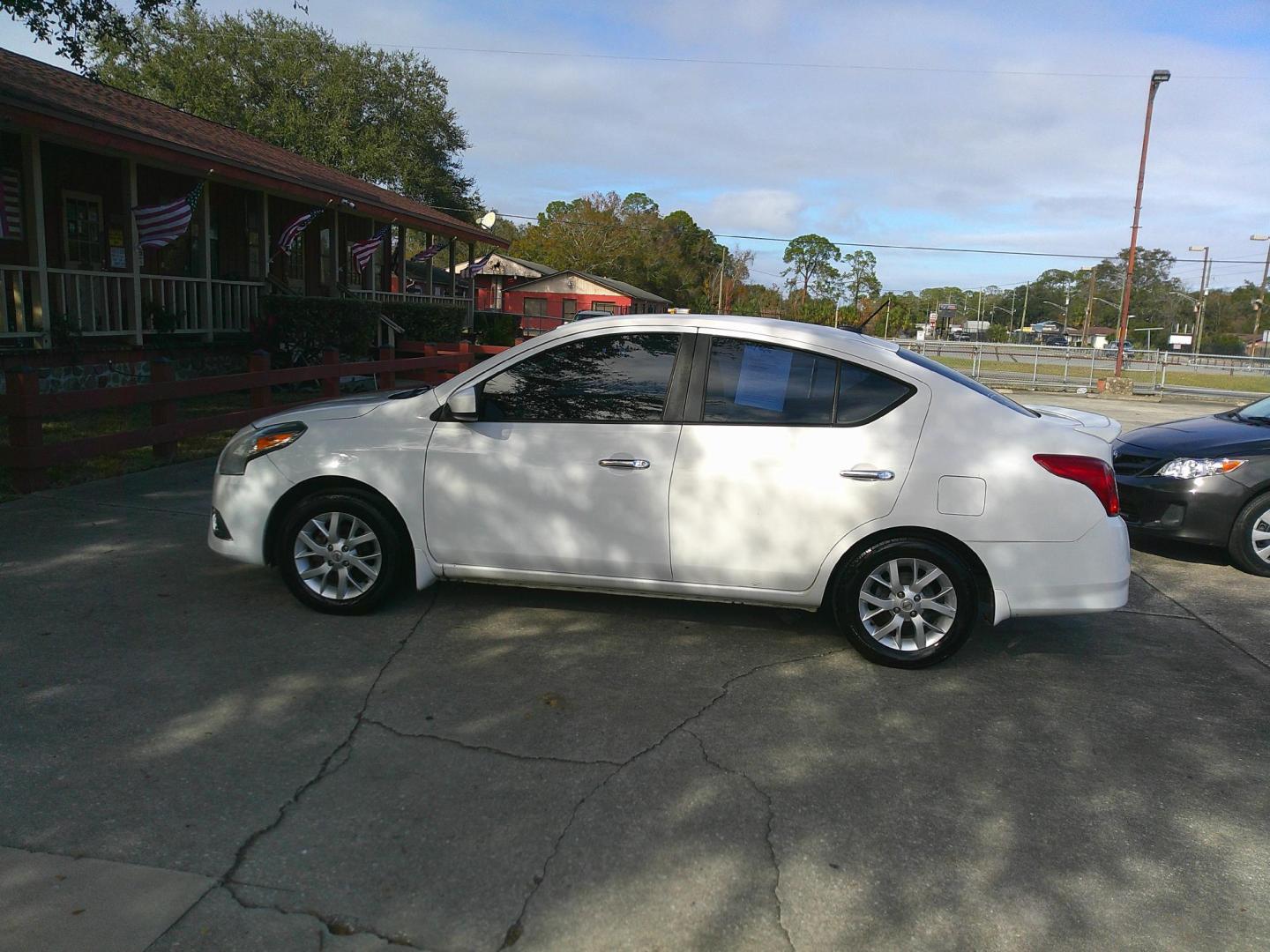 2017 WHITE NISSAN VERSA S; SL; SV (3N1CN7AP9HL) , located at 10405 Abercorn Street, Savannah, GA, 31419, (912) 921-8965, 31.988262, -81.131760 - Photo#1