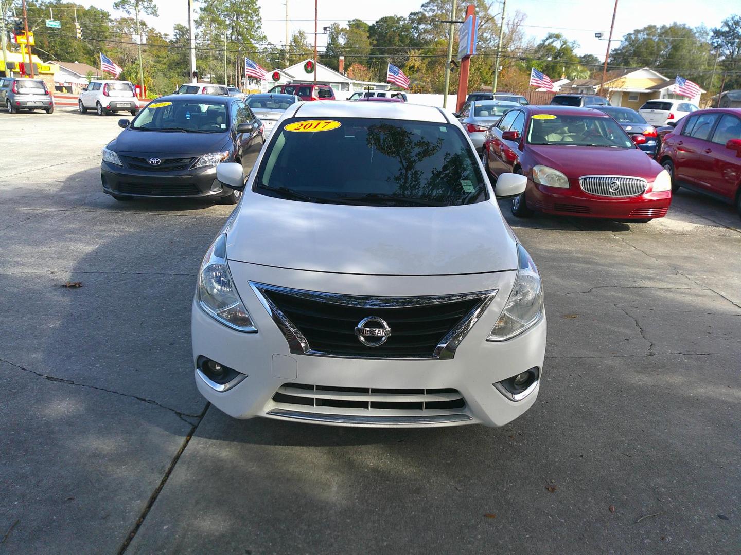 2017 WHITE NISSAN VERSA S; SL; SV (3N1CN7AP9HL) , located at 10405 Abercorn Street, Savannah, GA, 31419, (912) 921-8965, 31.988262, -81.131760 - Photo#0