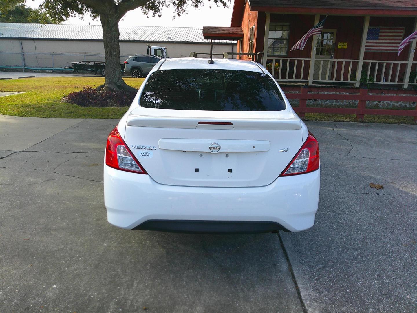 2017 WHITE NISSAN VERSA S; SL; SV (3N1CN7AP9HL) , located at 10405 Abercorn Street, Savannah, GA, 31419, (912) 921-8965, 31.988262, -81.131760 - Photo#4