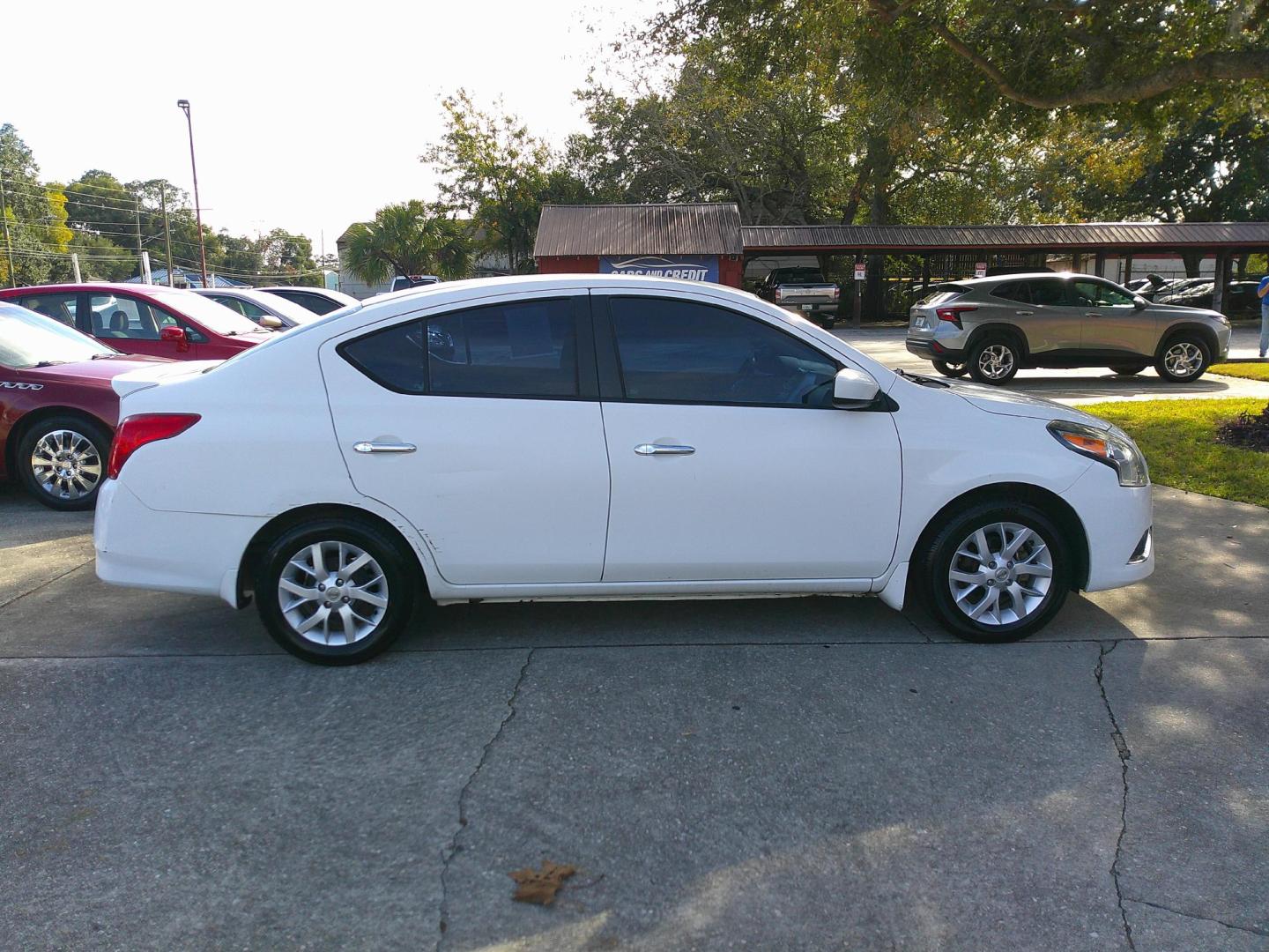 2017 WHITE NISSAN VERSA S; SL; SV (3N1CN7AP9HL) , located at 10405 Abercorn Street, Savannah, GA, 31419, (912) 921-8965, 31.988262, -81.131760 - Photo#2