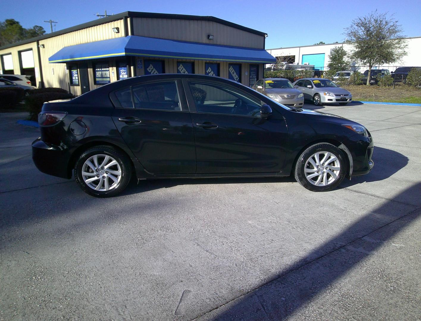 2012 BLACK MAZDA MAZDA3 I TOURING W/S (JM1BL1V79C1) , located at 1200 Cassat Avenue, Jacksonville, FL, 32205, (904) 695-1885, 30.302404, -81.731033 - Photo#1