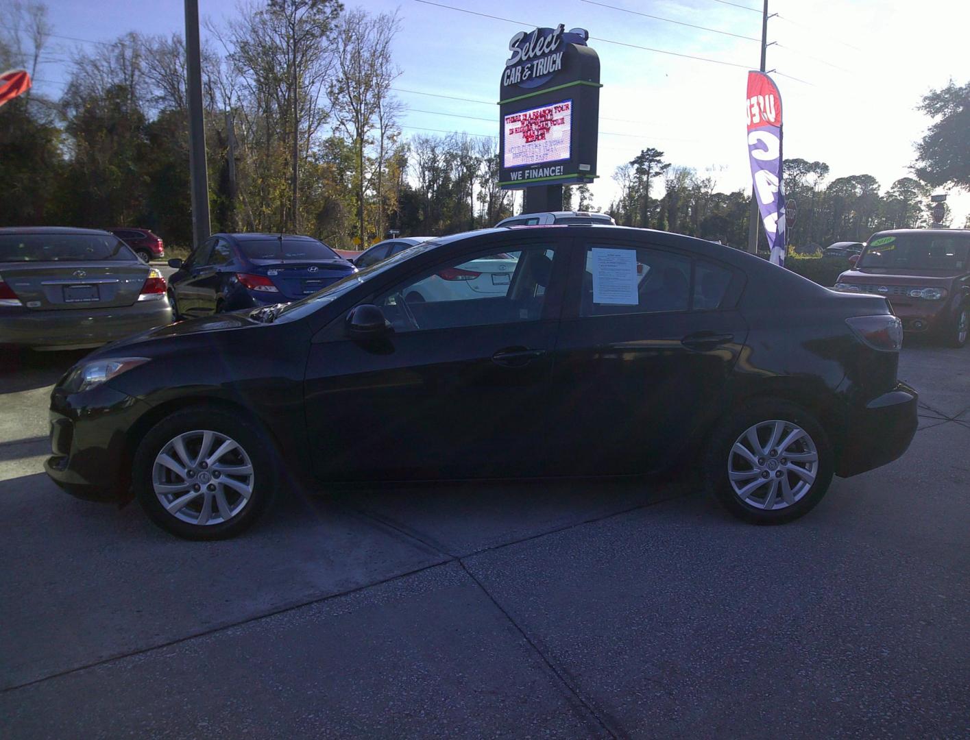 2012 BLACK MAZDA MAZDA3 I TOURING W/S (JM1BL1V79C1) , located at 1200 Cassat Avenue, Jacksonville, FL, 32205, (904) 695-1885, 30.302404, -81.731033 - Photo#3