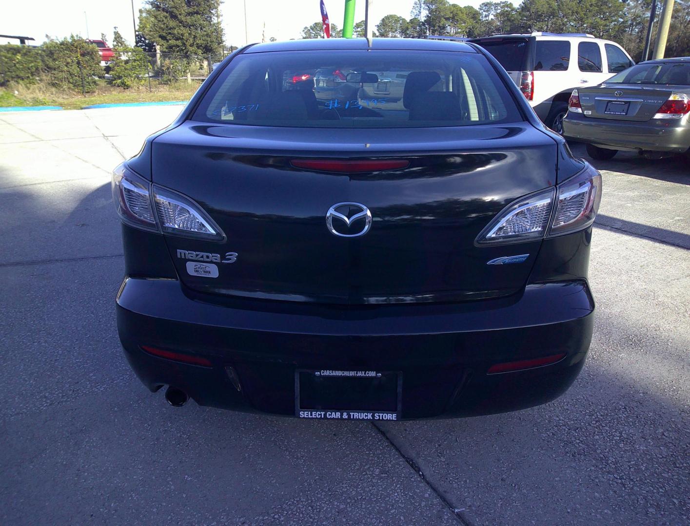 2012 BLACK MAZDA MAZDA3 I TOURING W/S (JM1BL1V79C1) , located at 1200 Cassat Avenue, Jacksonville, FL, 32205, (904) 695-1885, 30.302404, -81.731033 - Photo#4