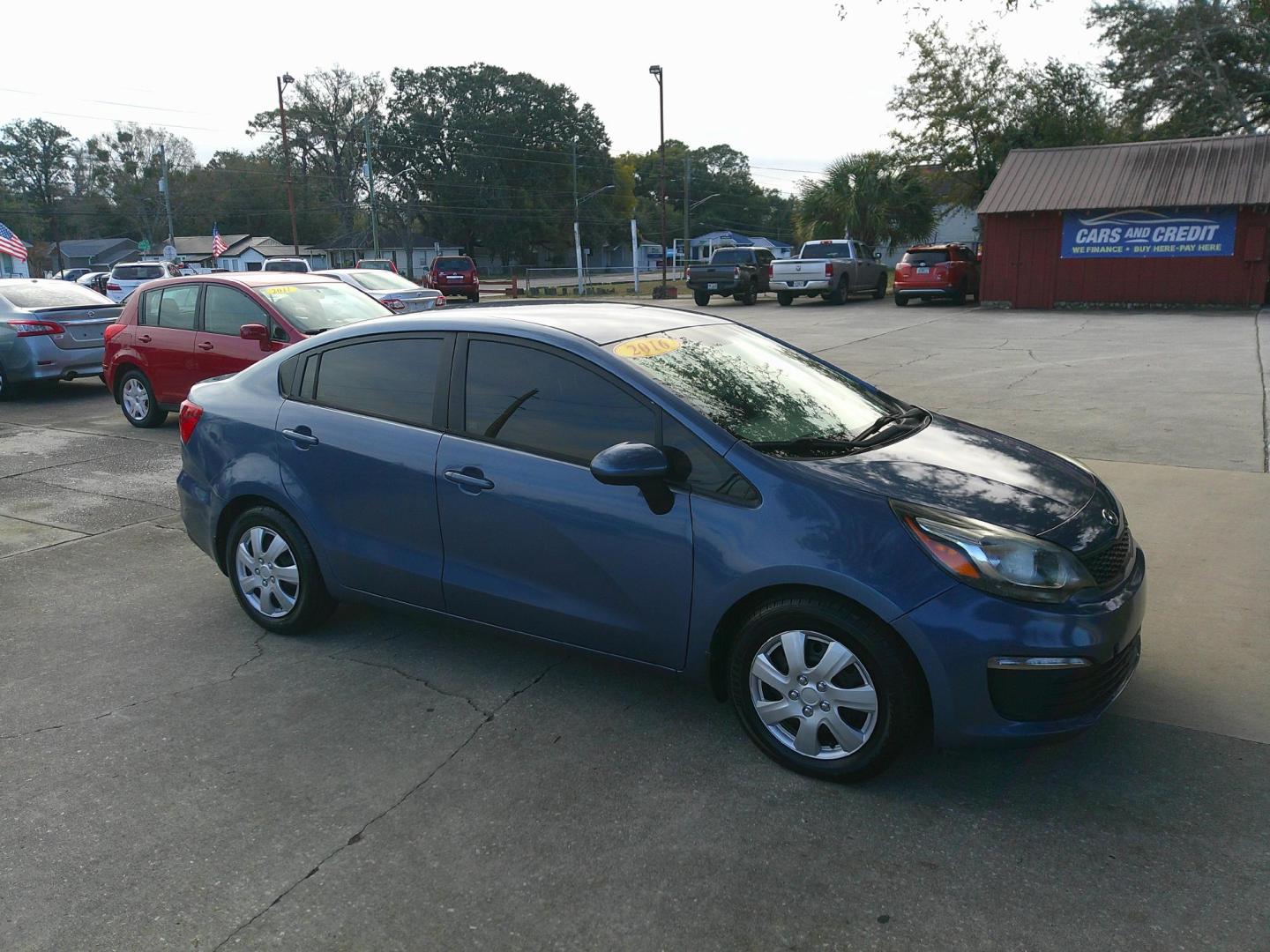 2016 BLUE KIA RIO LX (KNADM4A3XG6) , located at 1200 Cassat Avenue, Jacksonville, FL, 32205, (904) 695-1885, 30.302404, -81.731033 - Photo#1