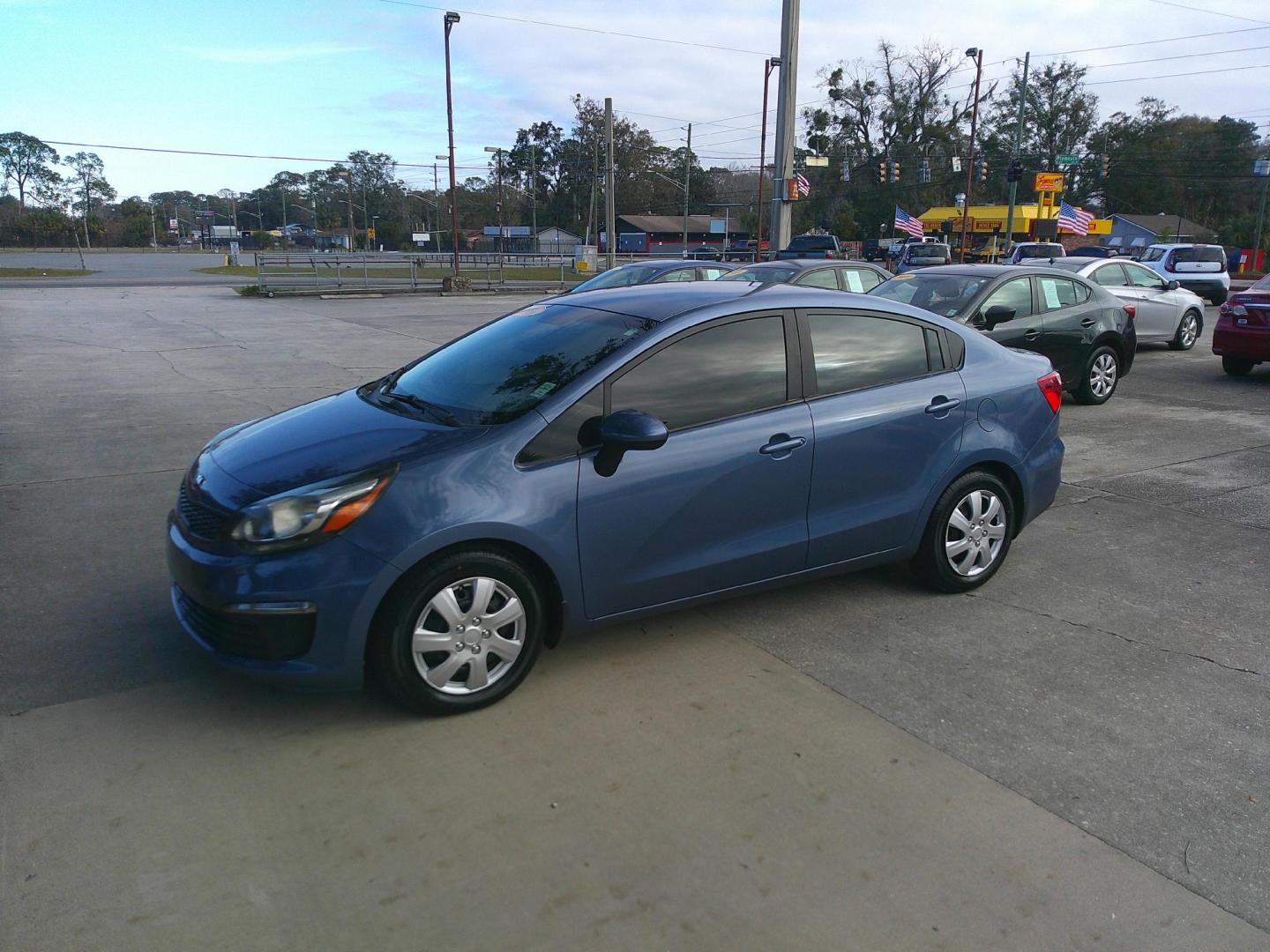 2016 BLUE KIA RIO LX (KNADM4A3XG6) , located at 1200 Cassat Avenue, Jacksonville, FL, 32205, (904) 695-1885, 30.302404, -81.731033 - Photo#2