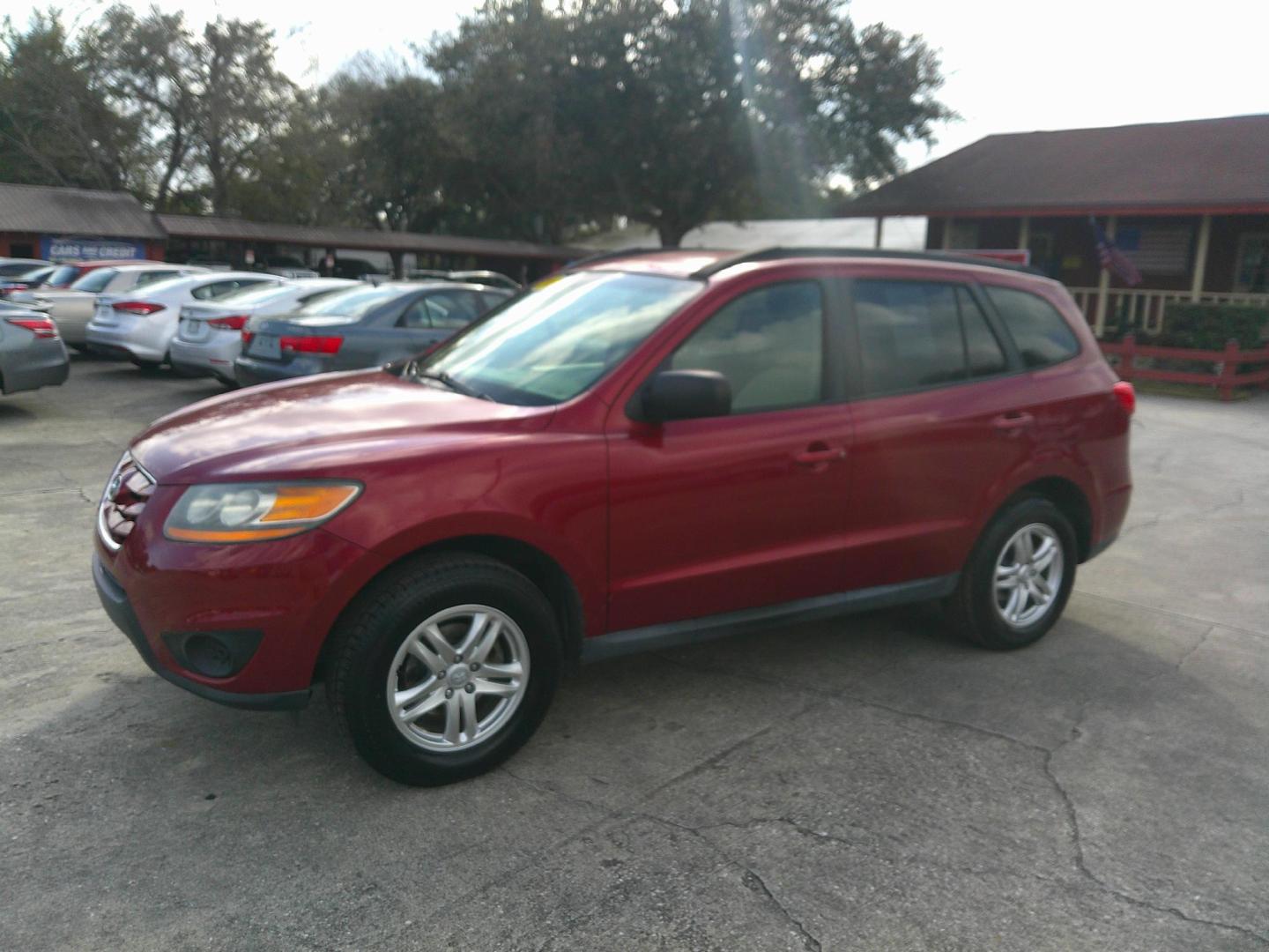 2011 RED HYUNDAI SANTA FE LIMITED; SE (5XYZG3AB1BG) , located at 1200 Cassat Avenue, Jacksonville, FL, 32205, (904) 695-1885, 30.302404, -81.731033 - Photo#1