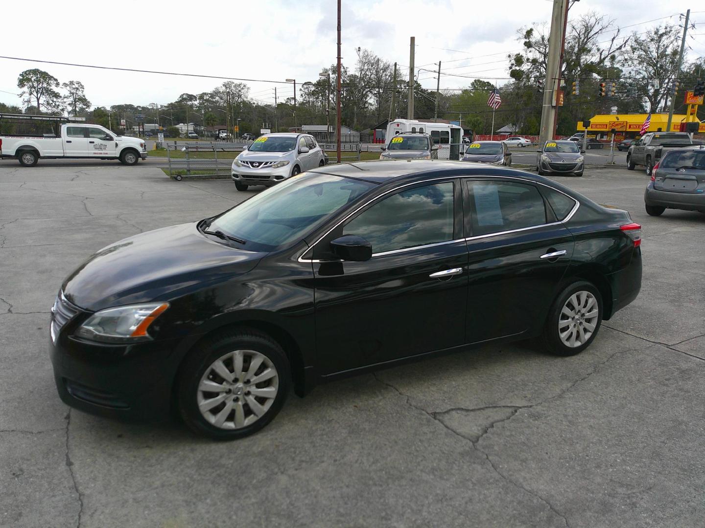 2015 BLACK NISSAN SENTRA SR; S; SL; SV (3N1AB7AP9FY) , located at 1200 Cassat Avenue, Jacksonville, FL, 32205, (904) 695-1885, 30.302404, -81.731033 - Photo#1